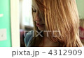 Teenage girl eating slice of apple 4312909