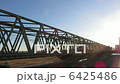 Sobu line train that shines after the rising sun 6425486