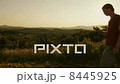Young Man Listening to Music in Nature at Sunset Time. 8445925