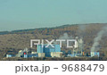Industrial factory with chimneys an 9688479