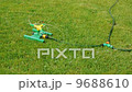 Lawn sprinkler splashing water 9688610