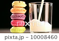 multicolored macarone and pouring milk 10008460