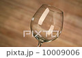 Pouring red wine and wooden background 2 10009006