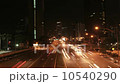 Time lapse of city freeway at night. 10540290