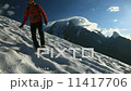 Mountaineer goes downhill along a glacier. In background the Mont Blanc, highest peak in Europe, Valle d'Aosta, Italy - low angle view - HD1080p Canon 5DMkII Mountaineer goes downhill along a glacier. In background the Mont Blanc, highest peak in Europe, Valle d'Aosta, Italy - low angle view - HD1080p Canon 5DMkII 11417706