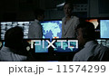 Security personnel working in system control room. 11574299