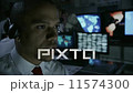 Security personnel working in system control room. 11574300