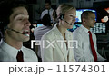 Security personnel working in system control room. 11574301