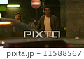 Attractive couple holding hands are crossing the road in London at night 11588567