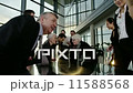 Diverse, happy business team in a meeting in contemporary office building 11588568