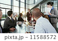 Diverse, happy business team in a meeting in contemporary office building 11588572