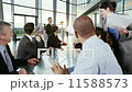 Confident multi ethnic business group in a striking modern office building 11588573