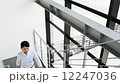 Business women climbing stairs 12247036