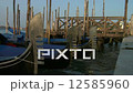 Gondola Ferros bob on the Grand Canal.Venice. 12585960