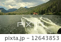 Hyperlapse of rear view of boat on beautiful mountain lake 12643853