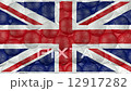 Soccer balls is falling down on a white and forming a great britain flag in front of the camera 12917282