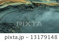 Boiling hot liquid mud in Hveraroend in Iceland 13179148