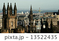 Edinburgh Cityscape with the Scott Monument and Amusement Park on Christmas Market in Scotland 13522435