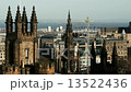 Edinburgh Cityscape with the Scott Monument and Amusement Park on Christmas Market in Scotland 13522436