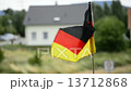 German flag on a balcony in a city 13712868