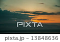 Sunrise in the mountains with cloudy sky with strong rays of sun coming to the ground 13848636