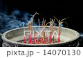 Incense Sticks Burning in Giant Pot in Front of Buddhist Temple  14070130