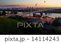 Sky lanterns flying over river and bridge at night 14114243