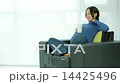 Asian pregnant woman siting in a sofa 14425496