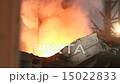 Putting iron in the furnace to melt 15022833