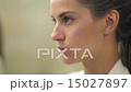 Young beautiful woman applying makeup  15027897