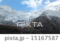 Mountain peaks in the snow on a sunny day 15167587