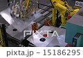 Robotic Arms Moving Sheet Metal Along Assembly 15186295