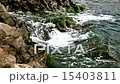 Waves on wild rock near the ocean or sea  15403811