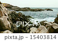 Rock and waves on shore or coast of ocean or sea  15403814