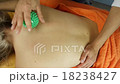 Back massage with massage ball in a medical office 18238427