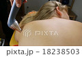Laser therapy back of a young woman  18238503