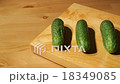 Fresh cucumbers on a board 18349085