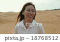 Asian woman smile outdoor desert wind blowing hair 18768512