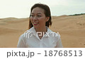 Asian woman smile outdoor desert wind blowing hair 18768513