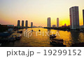 Boats driving in riverside on sunset, Bangkok Thai 19299152