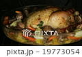 Appetizing roast chicken and potatoes in the oven 19773054