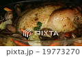 Appetizing roast chicken and potatoes in the oven 19773270