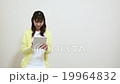 A woman who operates a tablet 19964832