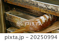 german baker pulls huge bread from the oven 11738  20250994
