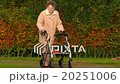 pensioner with wheel walker in autumn park pan 20251006