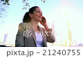 young business girl and talking on the phone with 21240755