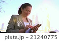 business girl writing a message on your smartphone 21240775