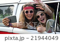 Young Cute Hippie Girls Having Fun Doing Selfie in 21944049