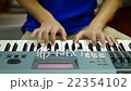 hands playing the keyboard or piano 22354102