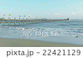 Wooden jetty on tropical beach 22421129
